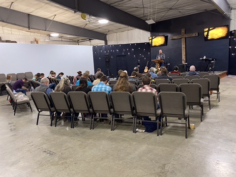 Congregation seated together listening to the message during a Sunday service